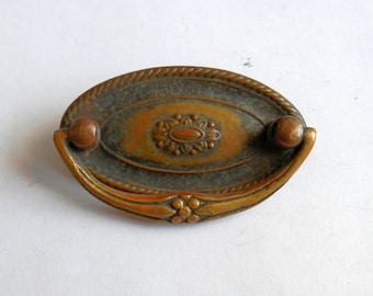 one (1) antique brass oval drawer pull 1 3/4" centers, vintage