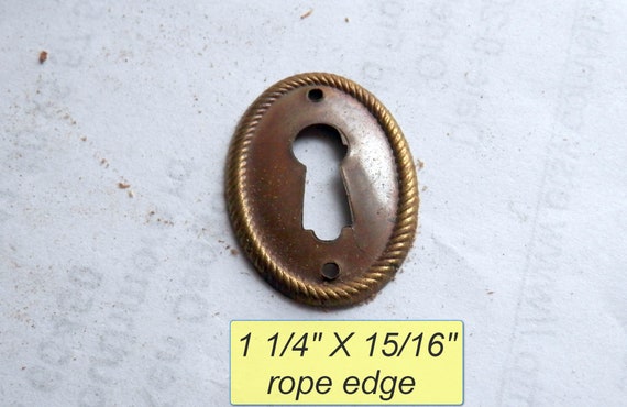 1-5/16 in. Antique Brass Faux Keyhole 1-5/16 in. Antique Brass Faux Keyhole