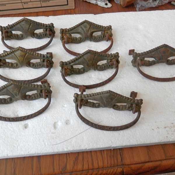 7 matching antique brass and iron drawer pulls 3 inch centers