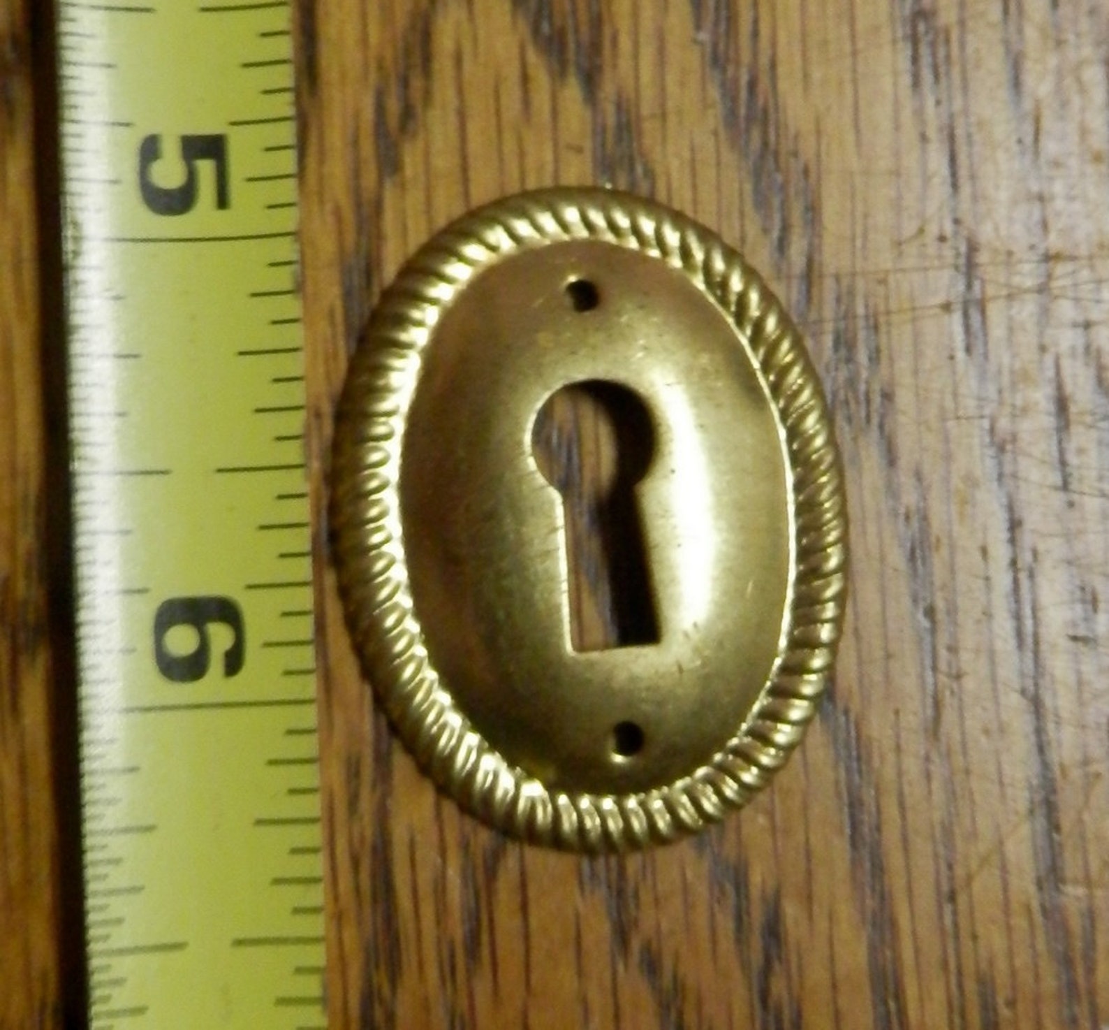 Dozen 12 solid brass key hole covers or escutcheons newer Etsy