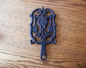 vintage cast iron trivet