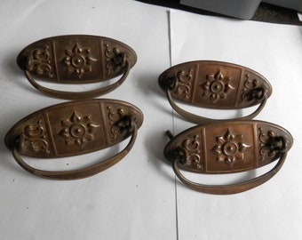 Set of four (4) stamped metal drawer pull handles with 3 inch centers vintage