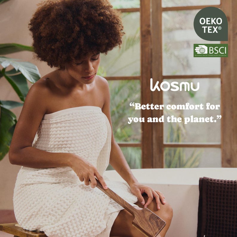 May include: A woman wrapped in a cream-colored waffle-weave towel, holding a wooden massage tool. The image includes the text "kosmu" and the tagline "Better comfort for you and the planet."