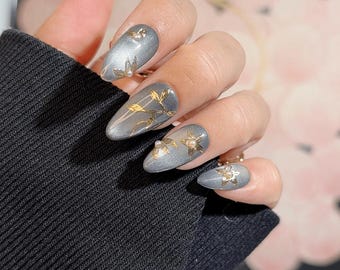 Silver Cat Eye Press-On Nails with Gold Floral Design – Medium Almond Elegant Look