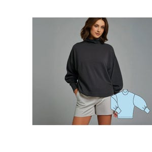 May include: A black turtleneck sweater with long sleeves and a relaxed fit. The sweater is shown on a model wearing it with light grey shorts.