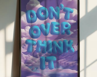 May include: A framed poster with a purple and blue landscape background. The words "DON'T OVER THINK IT" are written in large, blue, 3D letters.