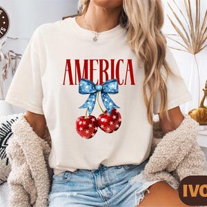 Camisa con lazo de cereza americana, camiseta Comfort Colors del 4 de julio, sudadera patriótica de cereza moderna, camisa femenina del Día de la Independencia