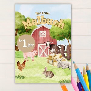 Może przedstawiać: Kolorowanka dla dzieci z motywem farmy. Okładka przedstawia czerwony budynek gospodarczy, świnię, krowę, jagnię, kurę i królika. Tekst "Mein Erstes Malbuch" znajduje się na górze, a "Ab 1 Jahr" w okręgu.