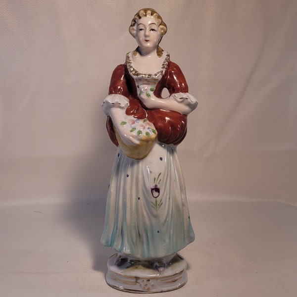 Ceramic Lady Figurine Made in Occupied Japan Statue Of A Lady Holding Flowers