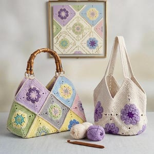 May include: Two crochet handbags in pastel colors. One bag has a bamboo handle and a patchwork design with floral motifs. The other is off-white with purple flower accents. Yarn balls and a crochet hook are also present.