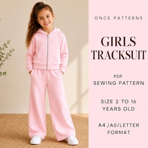 May include: A light pink tracksuit consisting of a hooded zip-up jacket and wide-leg pants. The text reads: ONCE PATTERNS GIRLS TRACKSUIT PDF SEWING PATTERN SIZE 2 TO 16 YEARS OLD A4 /A0/LETTER FORMAT. The outfit is worn with white sneakers.