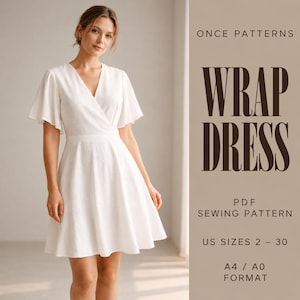 May include: A white wrap dress with flutter sleeves and a V-neckline. The text reads: ONCE PATTERNS WRAP DRESS PDF SEWING PATTERN US SIZES 2 - 30 A4 / A0 FORMAT. The dress features a fitted bodice and a flared skirt that falls above the knee.