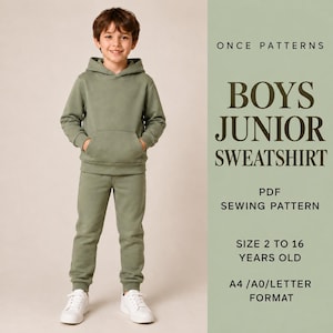 Op de afbeelding: Een saliegroene hoodie en bijpassende joggingbroek. De tekst aan de rechterkant luidt: ONCE PATTERNS BOYS JUNIOR SWEATSHIRT PDF SEWING PATTERN SIZE 2 TO 16 YEARS OLD A4 /A0/LETTER FORMAT.