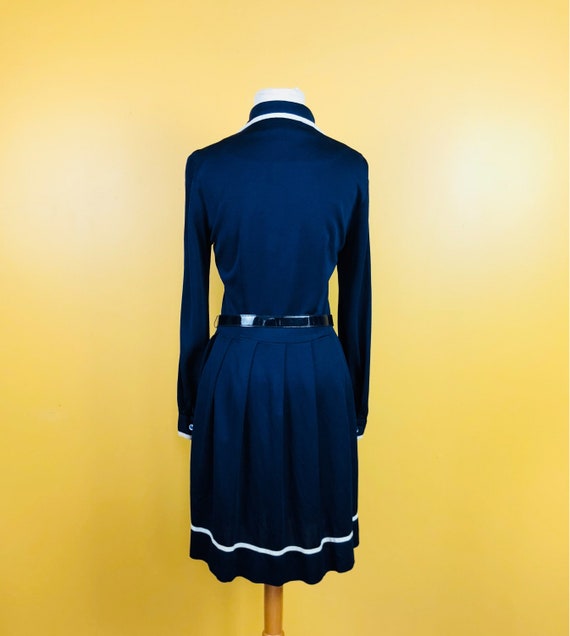 navy dress with white trim