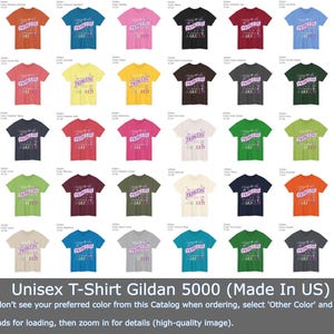 May include: A catalog of Gildan 5000 unisex t-shirts in various colors. Each shirt features the text "Princess" in a banner, with additional text below. The image includes a note about color selection and zooming for details.