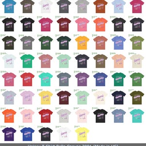 May include: A collection of unisex Bella Canvas 3001 t-shirts in various colors. Each shirt features the text "She's a Princess, She's a Queen" in a decorative font. The shirts are available in a wide range of colors, including blue, black, and pink.