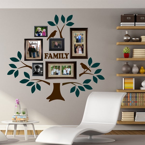 May include: A brown and teal family tree wall decal with the word "FAMILY" in brown letters. The decal has several branches with leaves and birds. There are eight black and white framed photos on the decal.