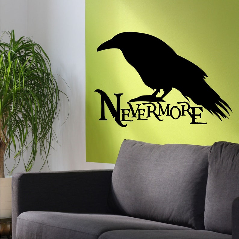 May include: Black and white silhouette of a raven with the word "NEVERMORE" underneath. The image is on a green background and a gray couch is in the foreground.