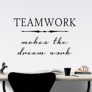 May include: Black and white wall decal with the text "TEAMWORK makes the dream work".
