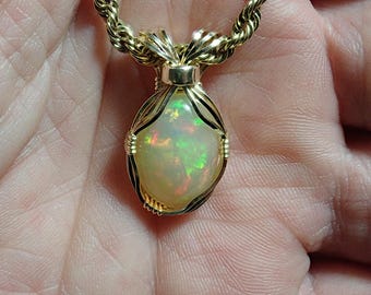 30891 Opal Pendant  wire wrapped Ethiopian Welo opal pendant  OOAK precious Welo opal minimalist wire wrap from thegemdealer