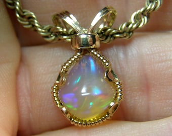 9572 Precious Opal Pendant  wire wrapped Ethiopian opal necklace  hand made Ethiopian Welo opal wire wrapped pendant from thegemdealer