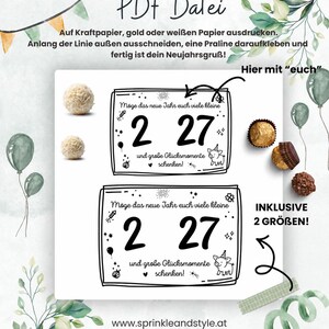 May include: A digital PDF file template for New Year's greetings featuring two rectangular cards with the text 'M&ouml;ge das neue Jahr euch viele kleine 2 27 und gro&szlig;e Gl&uuml;cksmomente schenken!' and illustrations of a pig, fireworks, and stars.