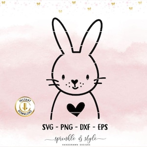 May include: Black and white line art illustration of a bunny rabbit with a heart on its chest. The bunny has large ears and a simple, smiling face.