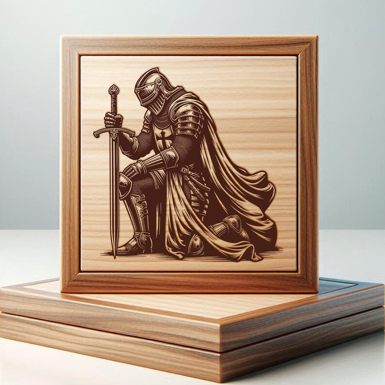 May include: A wooden box with a framed image of a knight kneeling with a sword. The knight is wearing armor and a cape. The image is in a brown wooden frame.