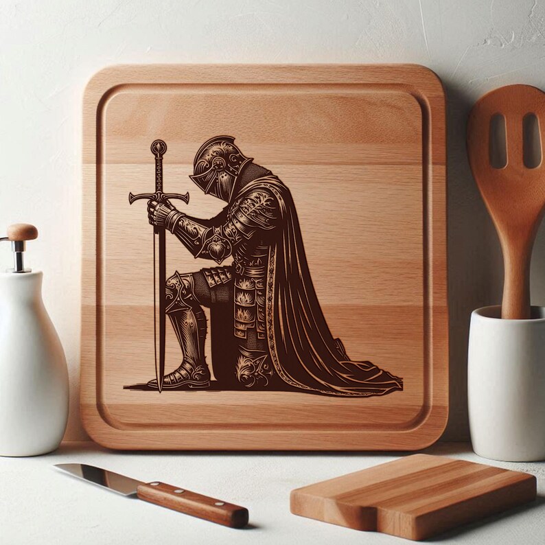 May include: A wooden cutting board with a laser engraved design of a knight kneeling with a sword. The knight is wearing armor and a cape. The board is brown and has a natural wood grain.
