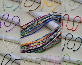 May include: Assortment of 18 twisted cords in various colors, including blue, green, red, white, black, purple, yellow, and orange. The cords are approximately 18 inches long and are perfect for crafting projects.