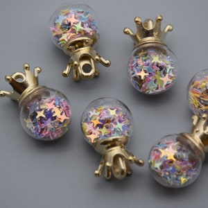 10 amuletos redondos de globo de cristal, viales de bolas de cristal con estrella de confeti brillante, colgantes de dijes de llavero, collar de pulsera, 26mm x 16mm