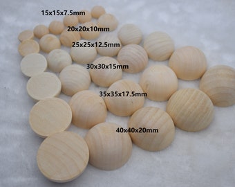 May include: Assortment of unfinished wooden half-round balls in various sizes, ranging from 15x15x7.5mm to 40x40x20mm. The balls are arranged in a pyramid shape on a white surface.