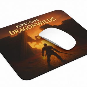 May include: A brown and orange mousepad with a silhouette of a person holding a sword. The text "Runescape Dragonwilds" is printed in yellow on the mousepad.