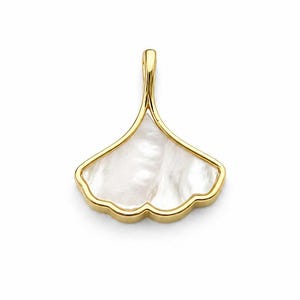 May include: A gold-colored pendant in the shape of a ginkgo leaf. The pendant features a white, pearlescent center and a scalloped edge. The bail is also gold-colored. The pendant is displayed against a white background.