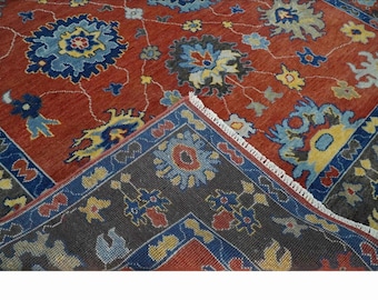 Hand-Knotted Wool Oushak Rug: Rust Red & Blue Floral Design
