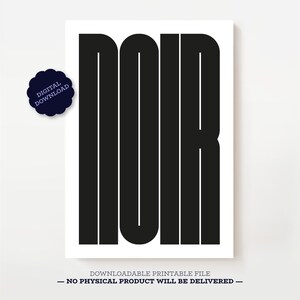 May include: A black and white print with the word "NOIR" in bold, sans-serif font. The word is centered on a white background. A dark blue sticker with the words "DIGITAL DOWNLOAD" is in the upper left corner.