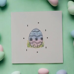 Tarjeta de felicitación con huevo de Pascua dibujado a mano: diseño primaveral en tonos pastel: tarjeta única hecha a mano de Jen’s Glitter Greetings