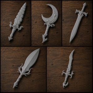 May include: A collection of five gray fantasy weapons, including swords and a crescent-shaped blade, arranged on a wooden surface. Each weapon features intricate designs and details, showcasing a medieval or fantasy theme.