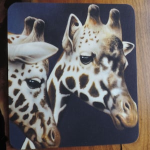 Giraffe fabric covered mousepad