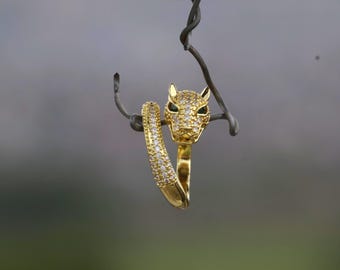 18Kゴールドパンサーリング：グリーンの目をあしらったアイスCZステートメントリング