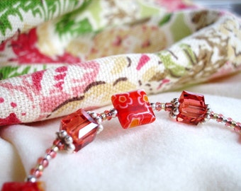 Ruby crystal and millefiore beaded bracelet