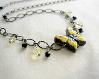 Yellow Butterfly Necklace with crystals on gunmetal chain