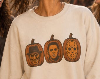 Halloween Horror Movie Sweatshirt: Spooky Pumpkin Crewneck