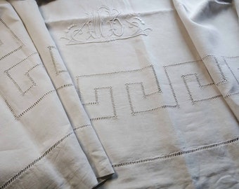 A beautiful French linen sheet, hand stitched.  Sumptuous bedding fabric or a gorgeous curtain
