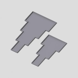 May include: Two gray, tiered, geometric shapes, resembling a staircase, are arranged in a staggered pattern. The shapes are made of a smooth, solid material.