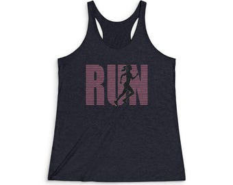 May include: A navy blue tank top with a pink and white graphic that says "RUN" with a silhouette of a person running inside the letters.