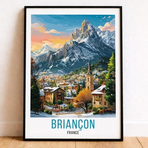 May include: Framed art print of Briançon, France, featuring a vibrant watercolor painting of a mountain town. The artwork showcases snow-capped mountains, a town with buildings, and a church steeple under a colorful sky. The text "BRIANÇON FRANCE" is at the bottom.