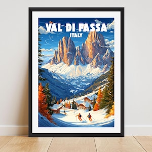 May include: Framed art print of Val Di Fassa, Italy. The image features a vibrant landscape of snow-covered mountains, a valley, and skiers. The text "VAL DI FASSA ITALY" is displayed at the top. The artwork is framed in a black border.