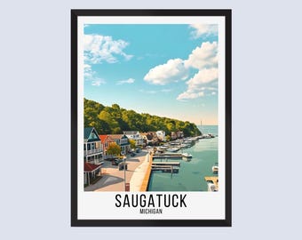May include: Framed print featuring a scenic view of Saugatuck, Michigan. The image showcases colorful buildings along a waterfront, boats docked in the harbor, and a bright blue sky with fluffy clouds. The town's name is printed in bold white letters at the bottom.