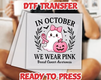 May include: DTF transfer featuring a design for Breast Cancer Awareness. The design includes a cute ghost with a pink bow and ribbon, a pink pumpkin, and the text "In October We Wear Pink". The words "Ready to Press" are also included.